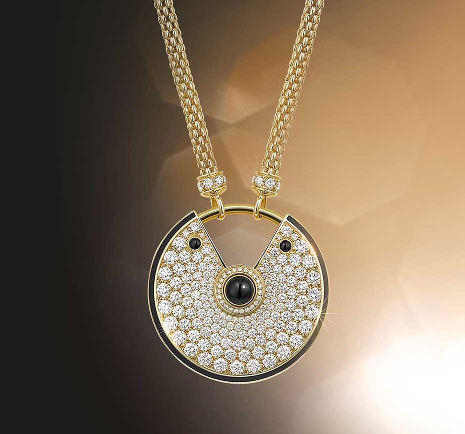 Amulette de Cartier large gold and black lacquer pendant with diamonds and three onyx cabochons