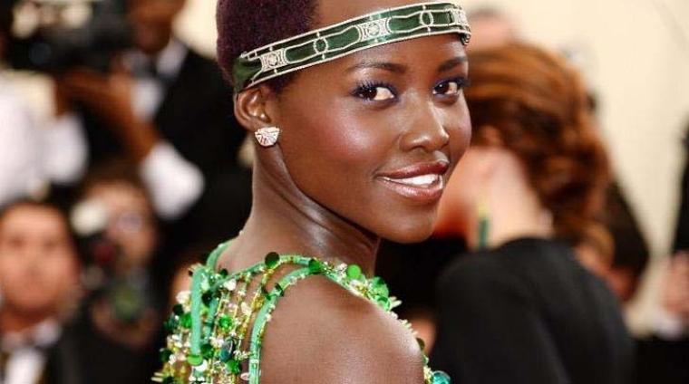 A closer look at the vintage Cartier diamond headpiece dating from 1906 worn by Lupita Nyong'o to the Met Ball 2014, which she customised with a green ribbon