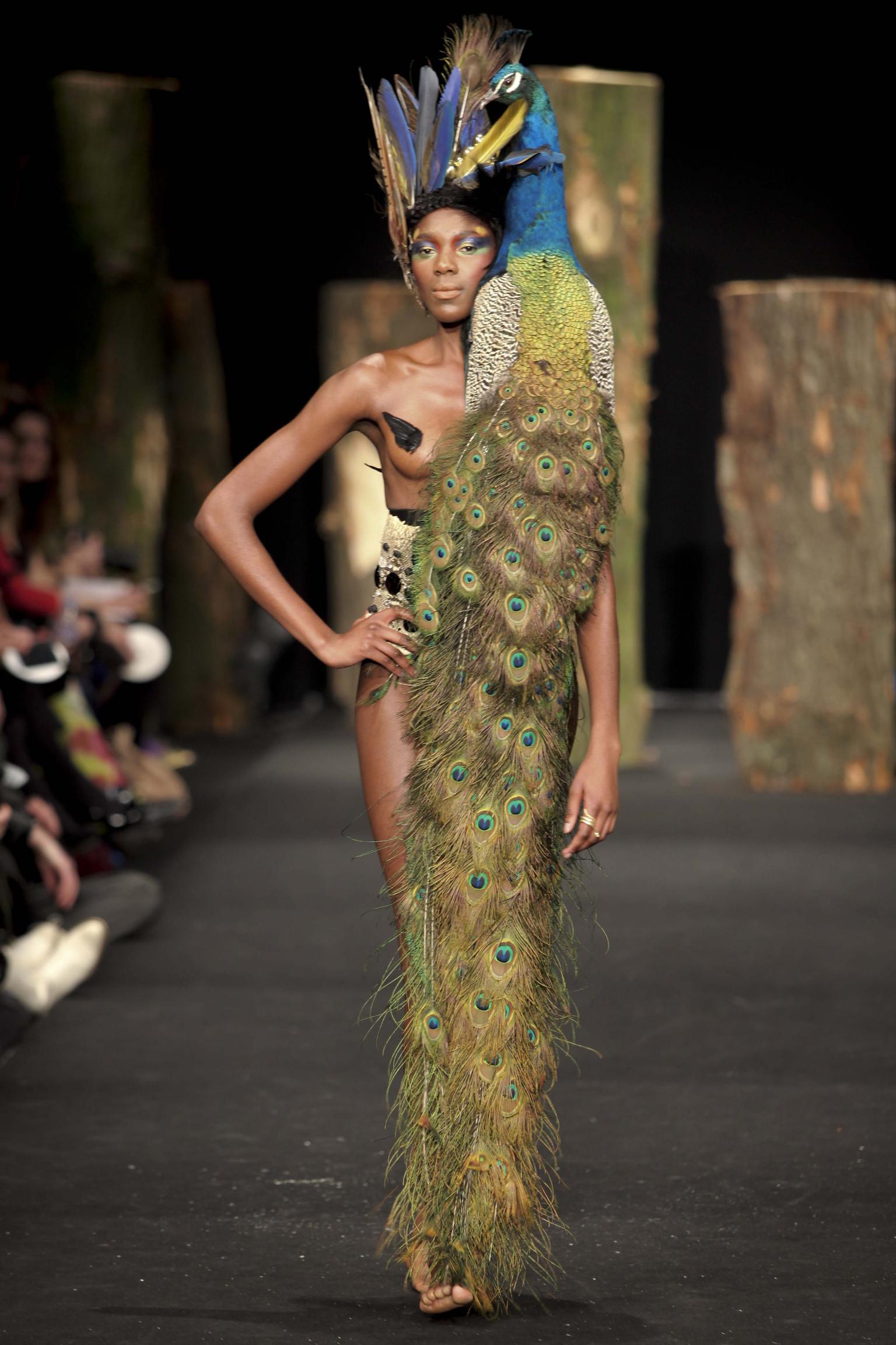 Blurring the line between sculpture and jewellery, Bibi van der Velden has put on catwalk shows highlighting her more avant-garde creations, including this stuffed peacock, which drapes over the body like the most regal jewel