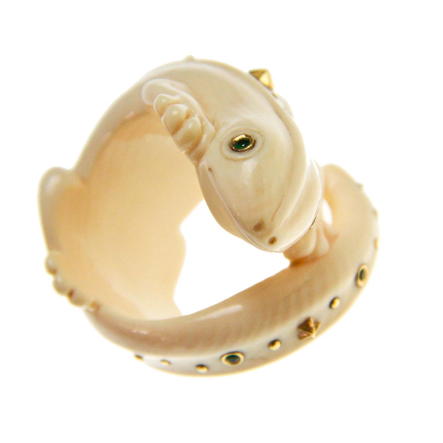 Bibi van der Velden Gecko ring made from carved woolly mammoth tooth, with yellow gold and green tsavorites