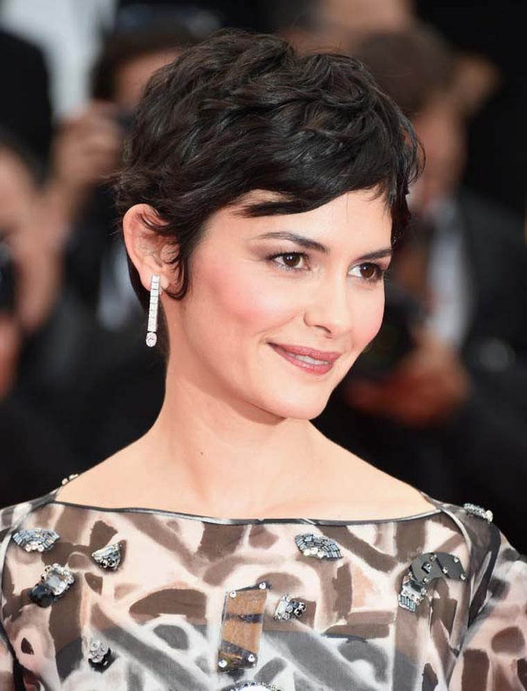 Audrey Tautou offset her embellished monochrome dress with chic diamond drop earrings by Chaumet