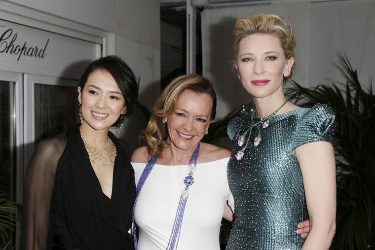 After a quick change of clothes, Cate Blanchett, pictured beside Caroline Scheufele, centre, and Zhang Ziyi, arrived at the Trophée Chopard 2014 party in a dress worthy of any red carpet, paired with a tsavorite, pink sapphire and ruby floral necklace fro