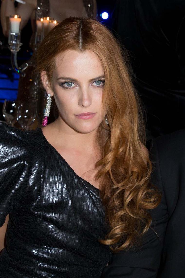 Opposites attract: Riley Keough wore de GRISOGONO's ruby and diamond earrings, set with diamonds and rubies