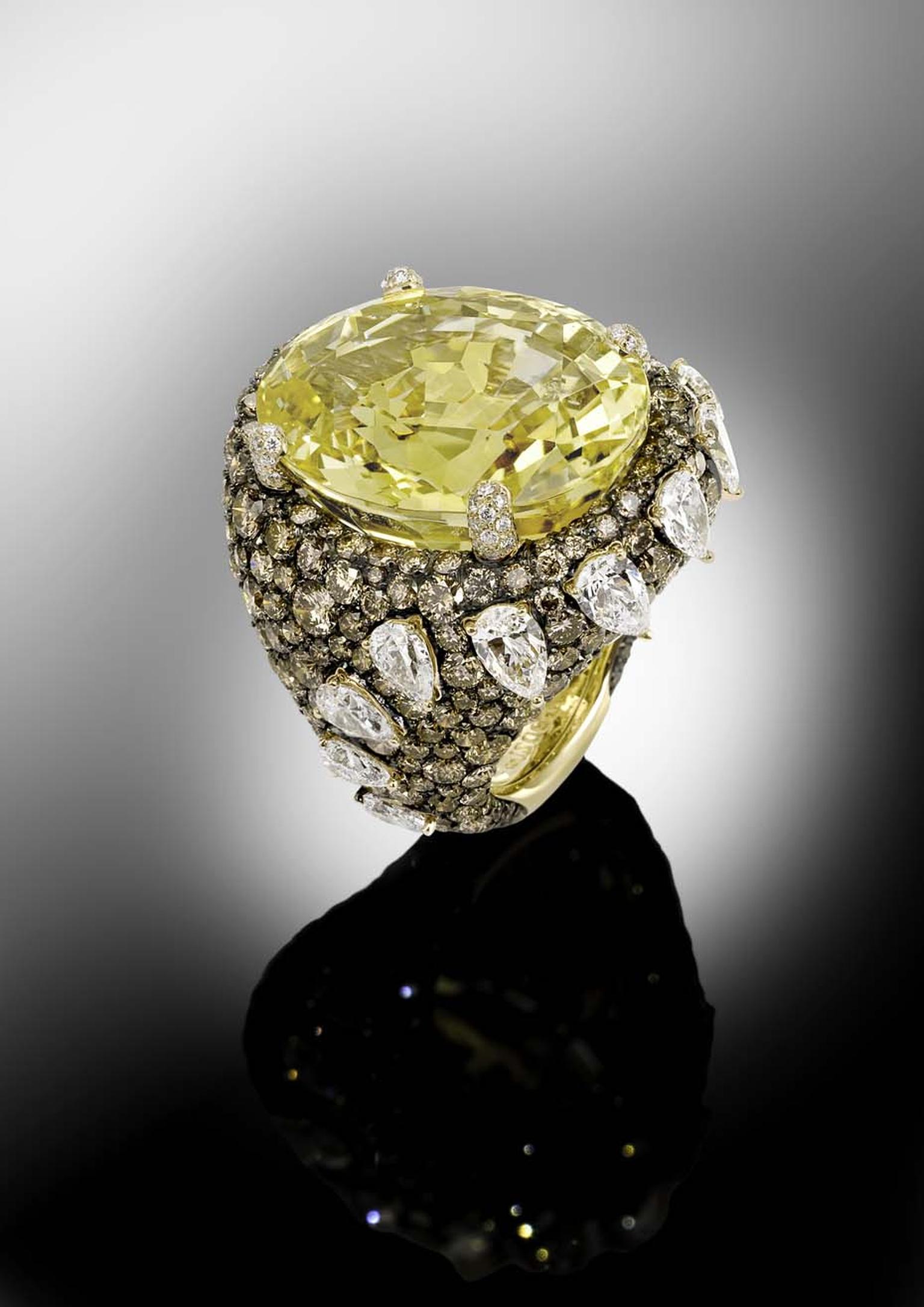 The de GRISOGONO yellow sapphire ring worn by Toni Garrn, Leonardo di Caprio's girlfriend, to the Eden Roc party hosted by de GRISOGONO