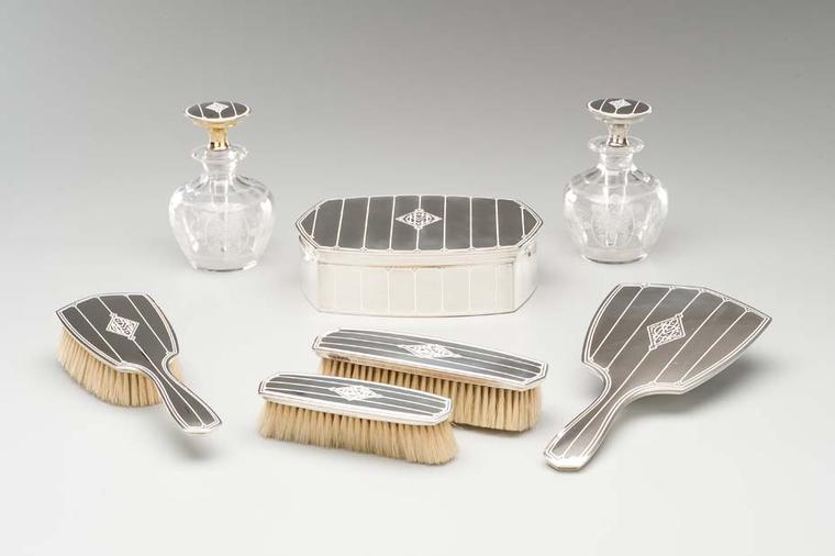 Cartier dressing table set with silver, enamel and glass circa 1915. Image: Courtesy Hillwood Estate, Museum and Gardens