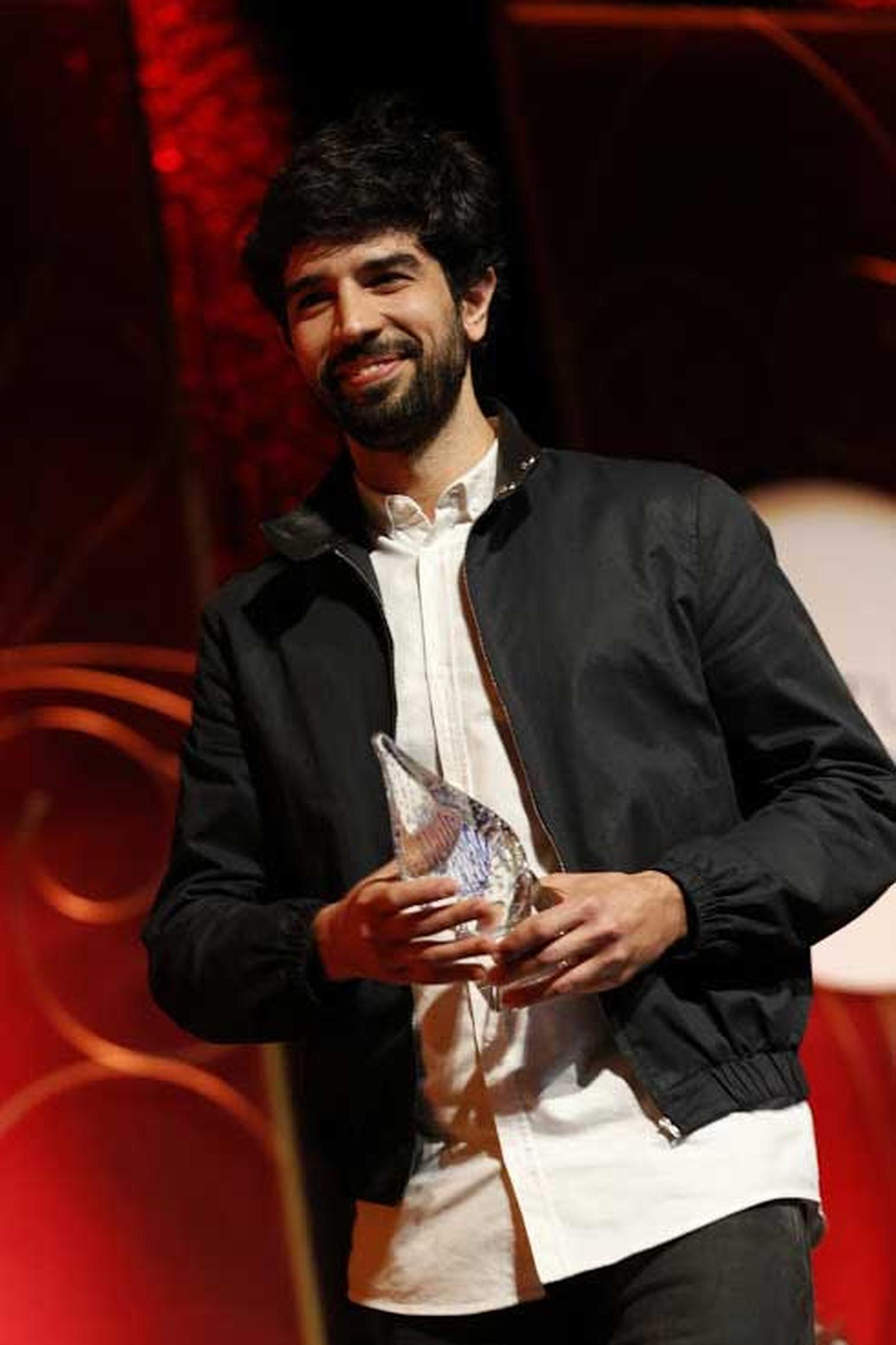 Fernando Jorge picking up his award for best jewel in the coloured gems below $20,000 category at the Couture Show in Las Vegas, where he exhibited as part of Rock Vault 2014.