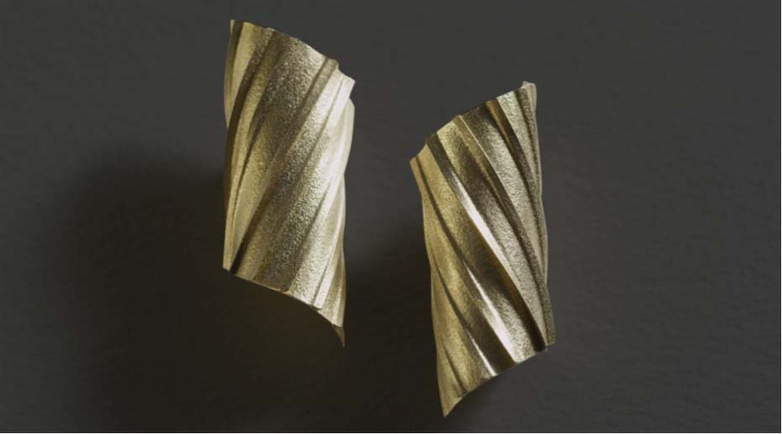 Jacqueline Mina's Pleated Gold jewellery collection plays with the effects of lighting, allowing the light to bounce in different directions.