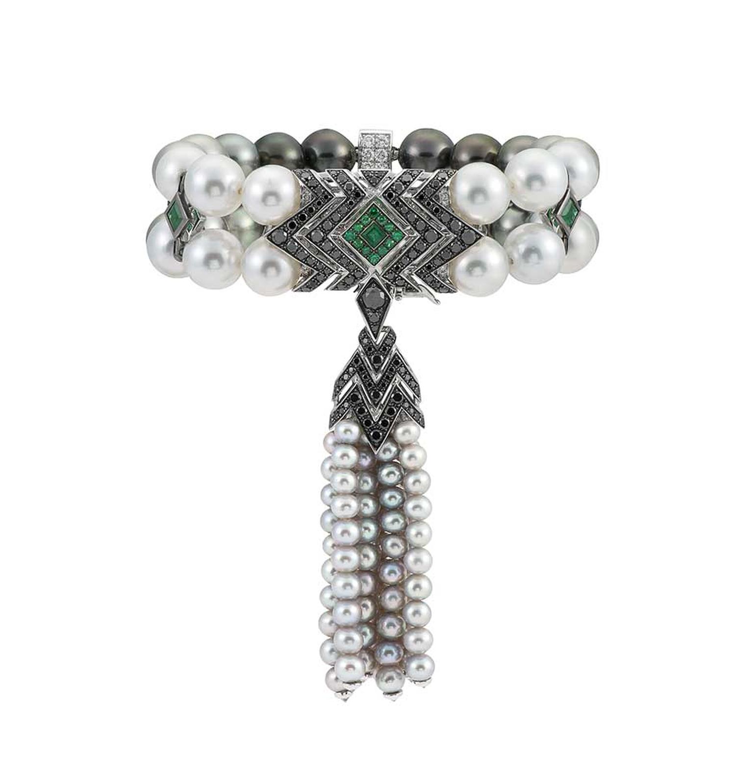Stephen Webster Lady Stardust pearl tassel bracelet set with black and white diamonds and emeralds.