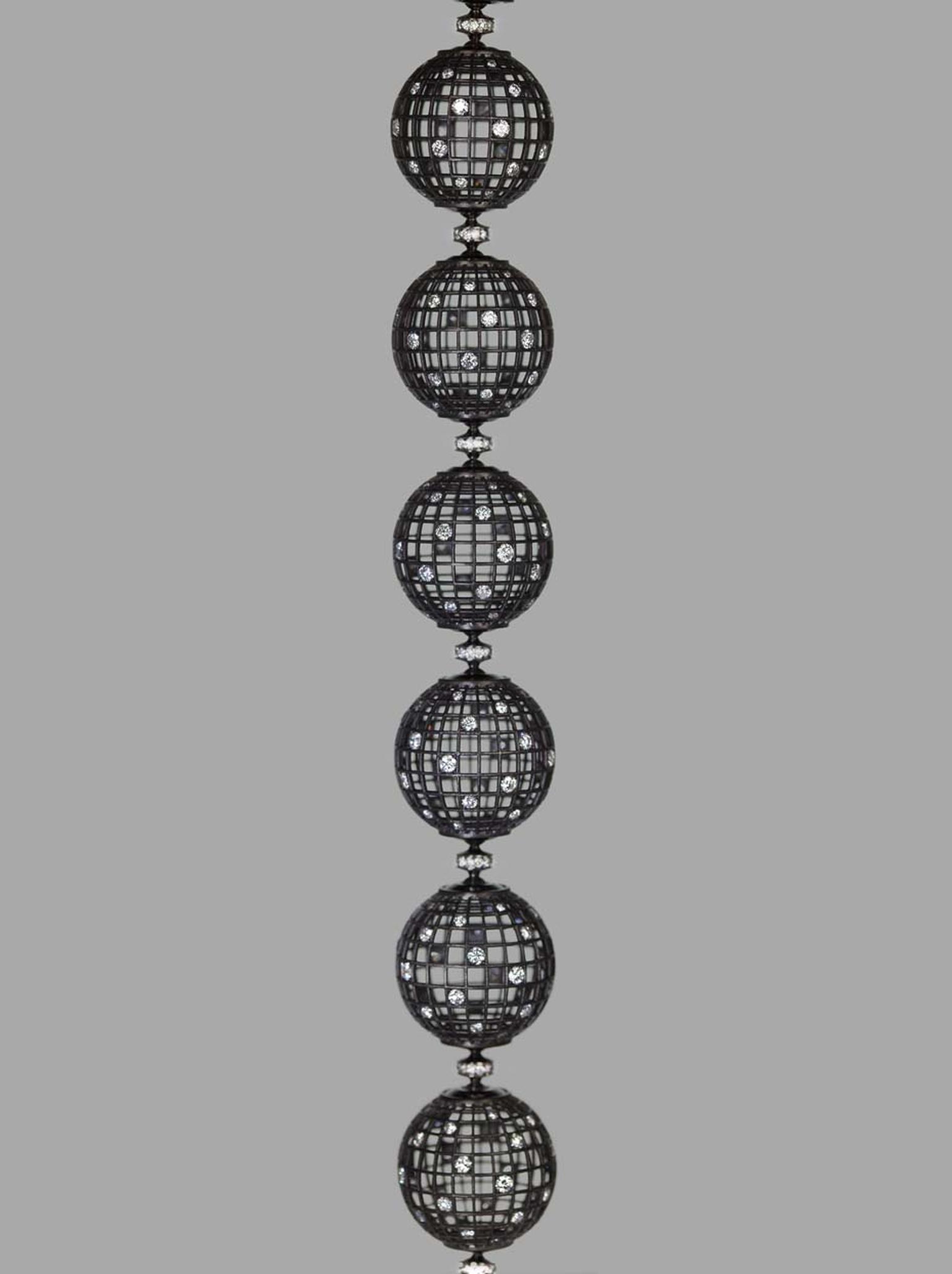 Roule & Co Star Dust Globe bracelet in blackened white gold and white diamonds.