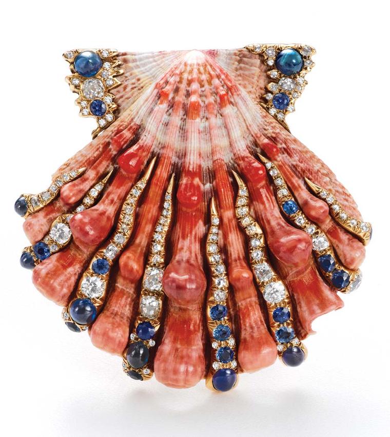 Verdura Lion’s Paw brooch featuring natural shell, sapphires and diamonds in gold, circa 1945.