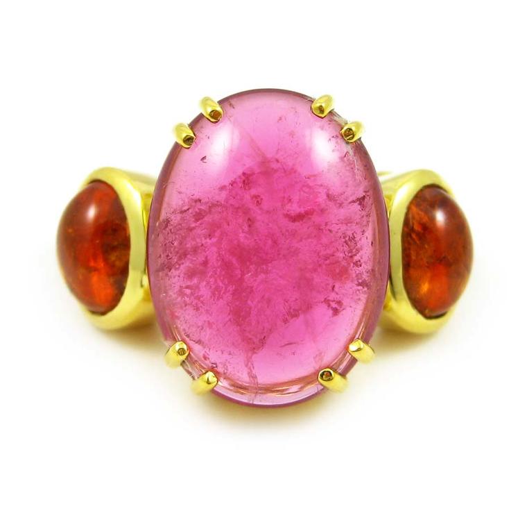 K. Brunini Chains of Love Twig ring in yellow gold with a central 15.92ct rubellite cabochon and two mandarin garnet cabochons ($14,880).