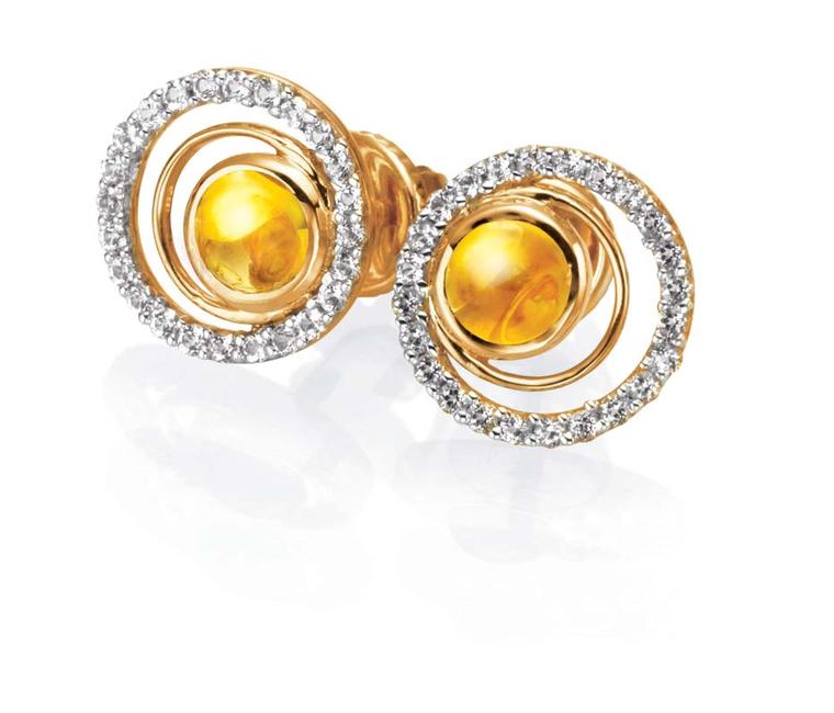 Tanishq IVA 2 collection gold circular ear studs with diamonds and citrine.