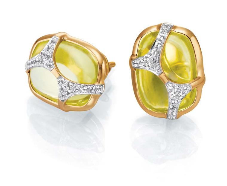 Tanishq IVA 2 collection gold ear studs with peridots, overlaid with diamonds.