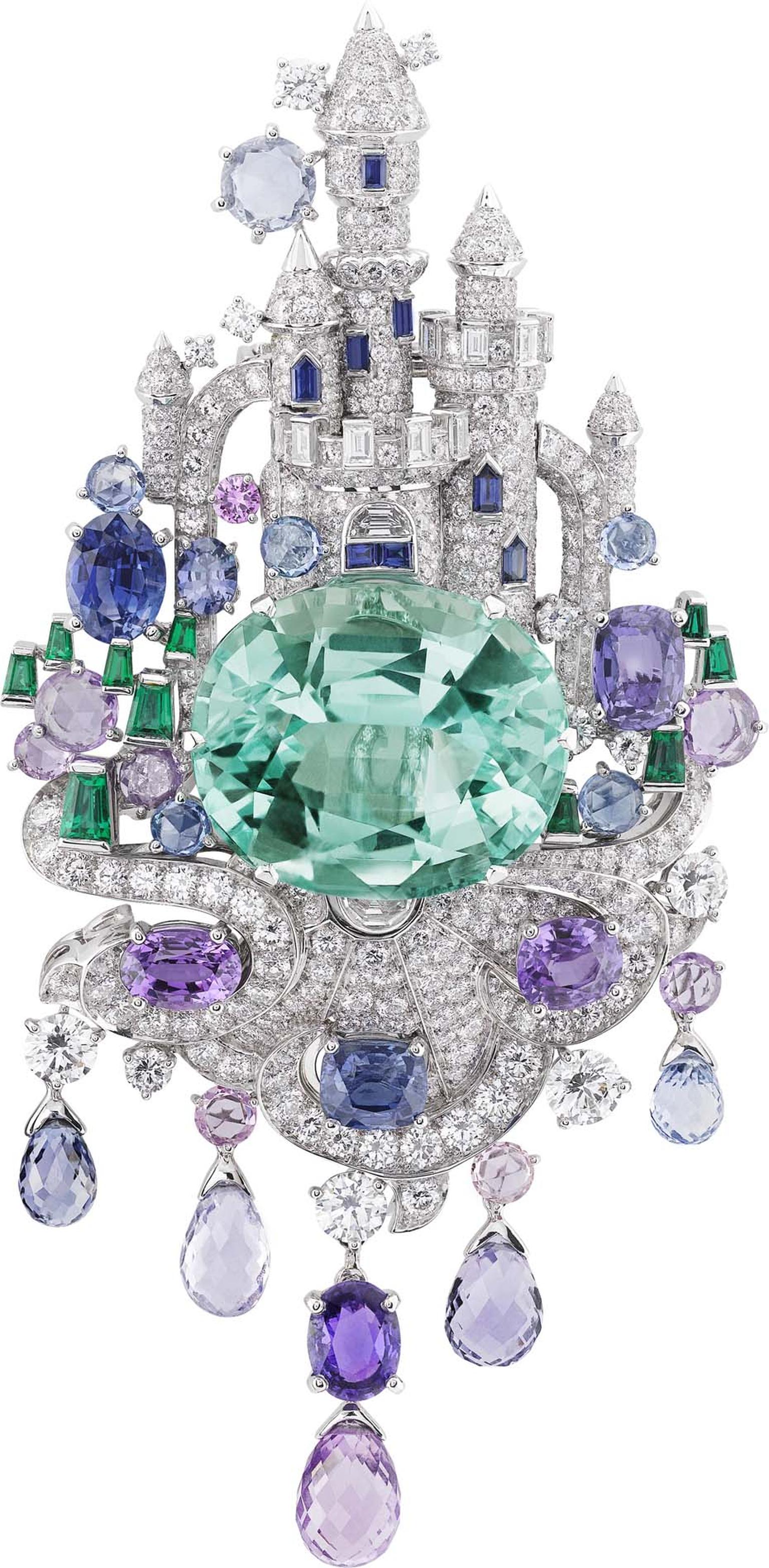 Van Cleef & Arpels Peau d'Âne collection white gold Enchanted Castle brooch featuring multiple cut diamonds, emeralds, sapphires and briolettes surrounding a 39ct oval cut emerald.