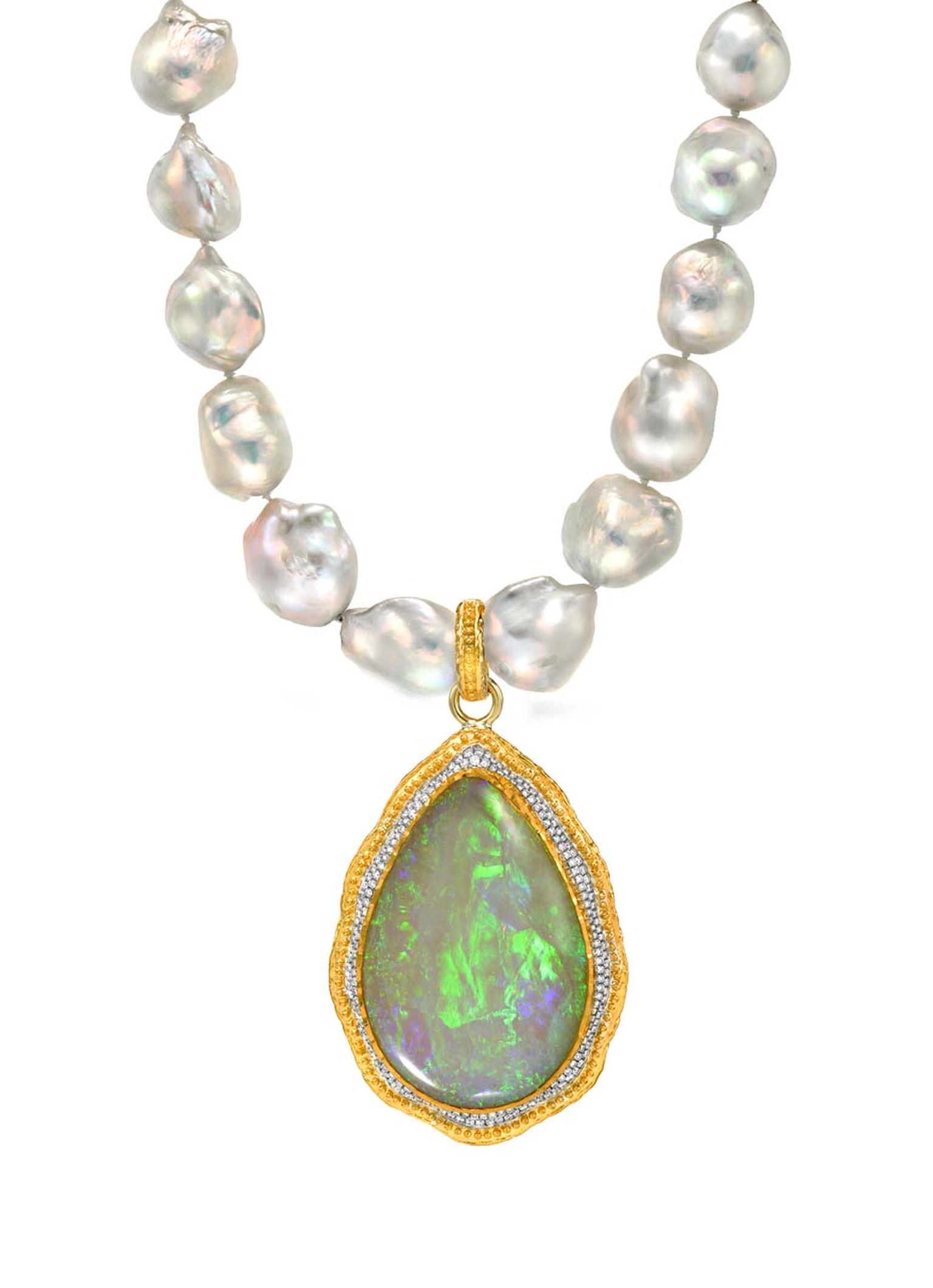 Victor Velyan gold and silver pendant with a central 36.55ct black opal surrounded by diamonds on a pearl necklace.
