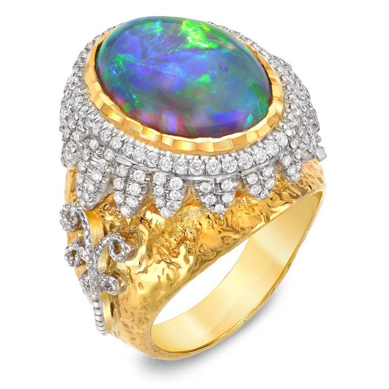 Victor Velyan yellow and white gold ring with a central black opal and diamonds.