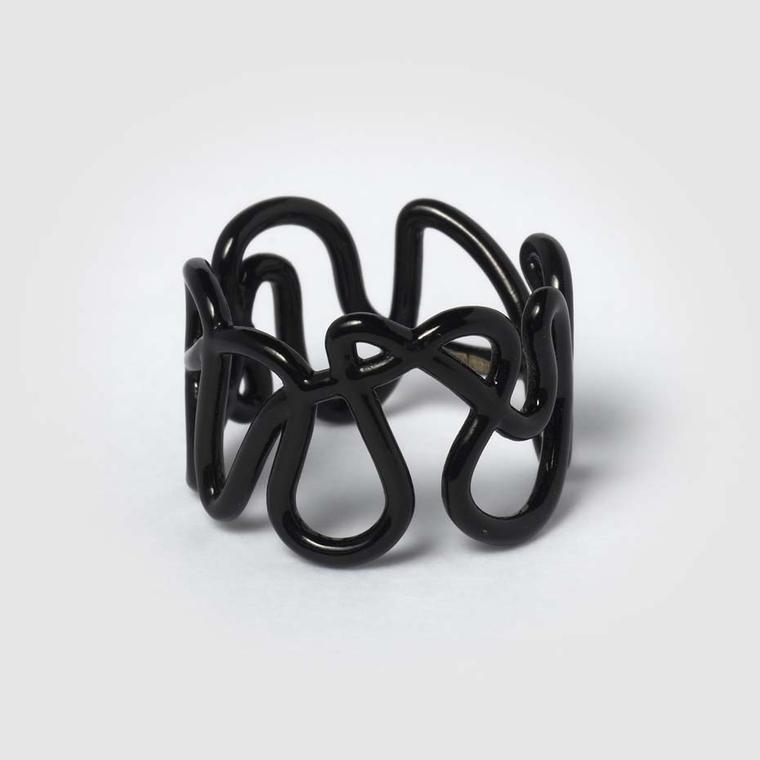 Repossi White Noise collection black lacquered gold ring.
