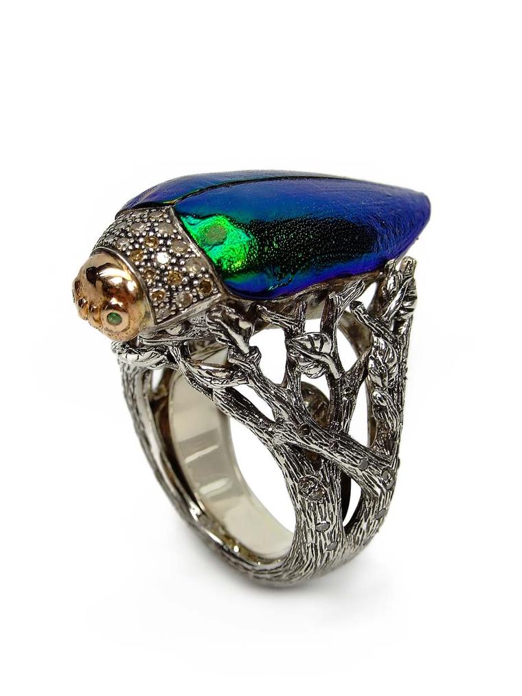 Scarab beetles creep into luxury jewellery that flaunts the natural iridescence of their wings