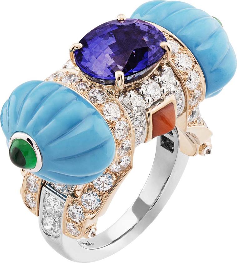 Van Cleef & Arpels Peau d'Âne collection collection white gold ring featuring pink gold, round diamonds, pear, turquoise, coral, emerald cabochon, and a 5.15 ct oval purple sapphire.