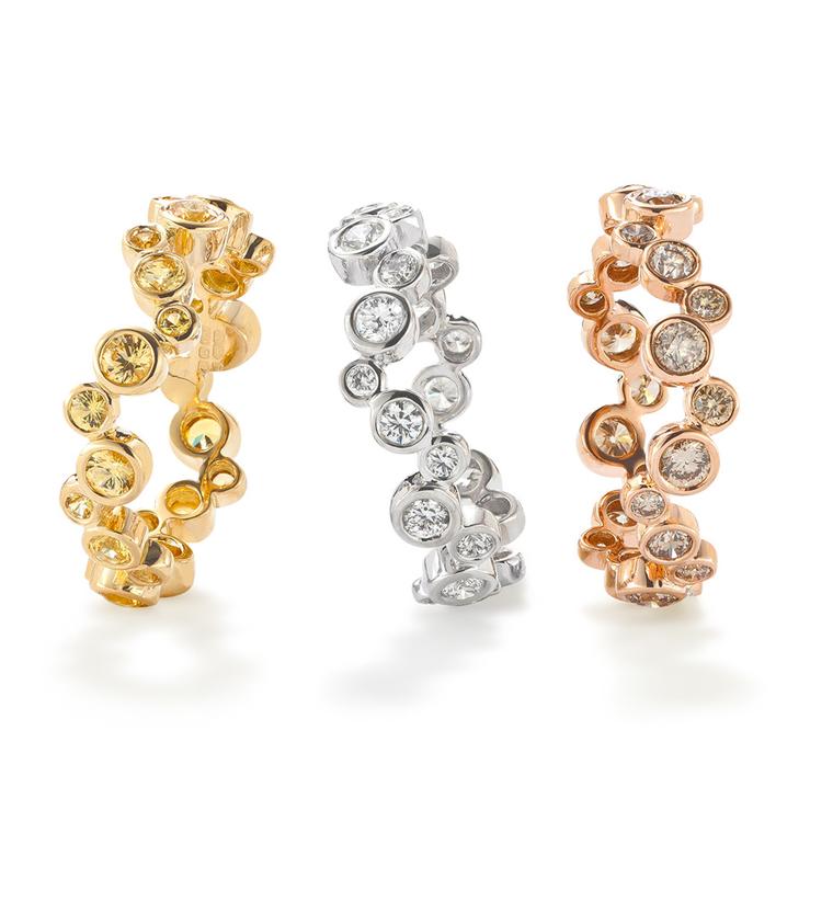 Robinson Pelham stackable diamond rings in yellow gold with yellow sapphires, white gold with white diamonds and rose gold with brown diamonds.