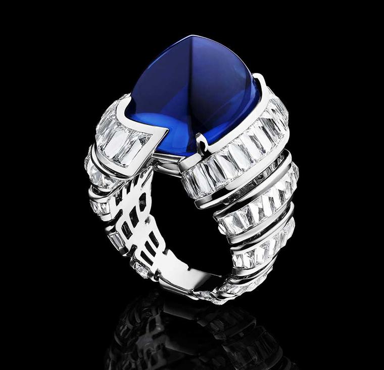 Alexandre Reza Turban ring in platinum with a large sugarloaf cabochon blue sapphire from Ceylon weighing 27.74ct, surrounded by a swirl of baguette-cut diamonds in white gold.