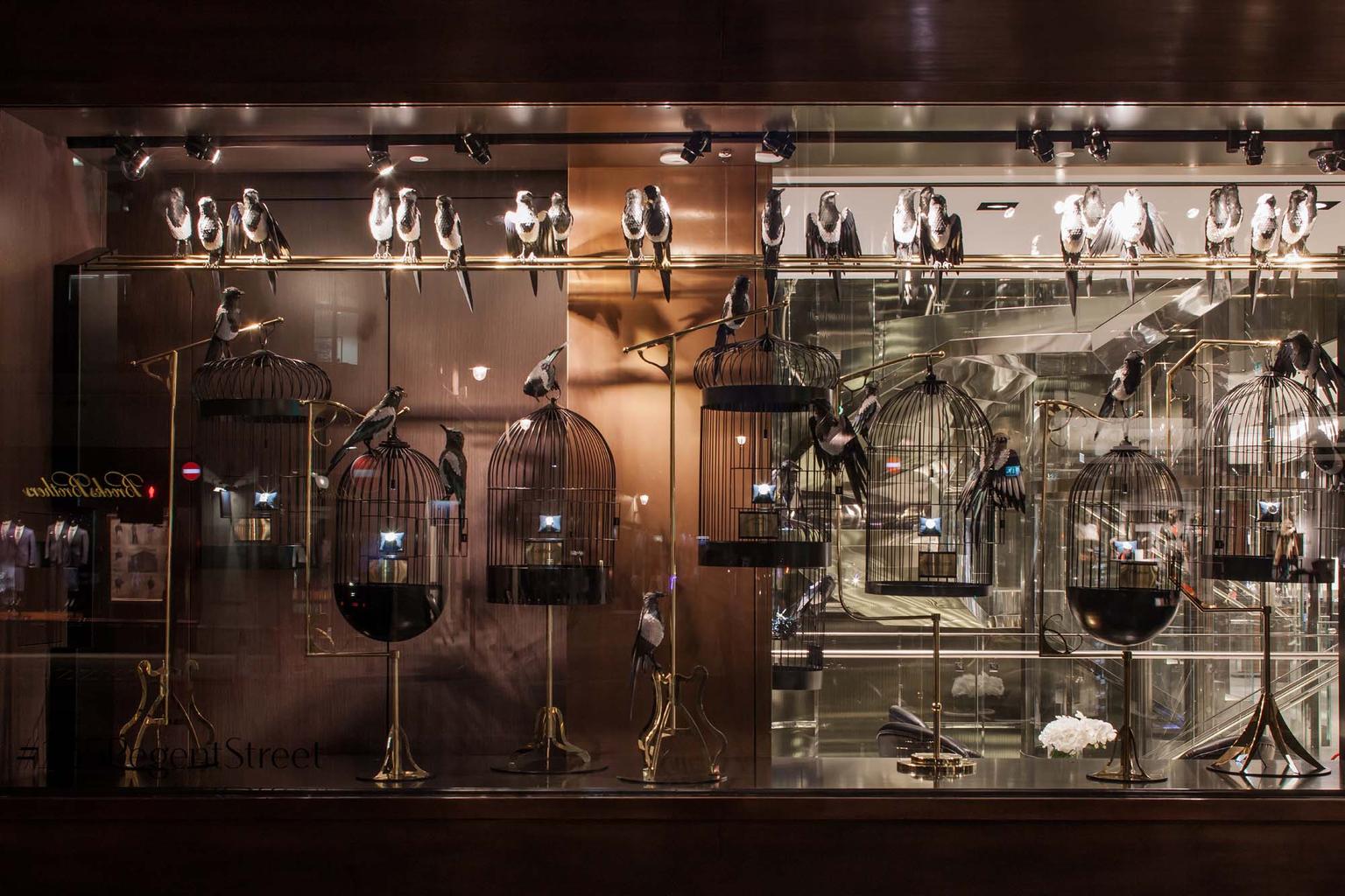 Inspired by Alfred Hitchcock's "The Birds", a display of magpies - a bird best known for its attraction to shiny objects - introduces a touch of humour to the Watches of Switzerland flagship store.