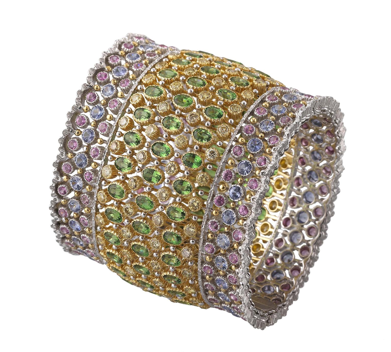 Buccellati cuff bracelet with 51.41ct tsavorites, Fancy diamonds and blue and pink sapphires.