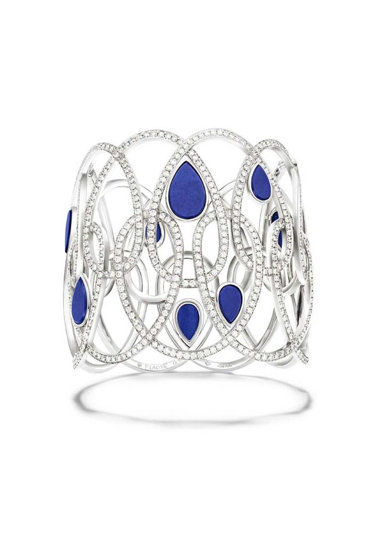 Piaget's Extremely Piaget collection white gold bracelet set with 870 brilliant-cut diamonds and nine lapis lazuli cabochons.