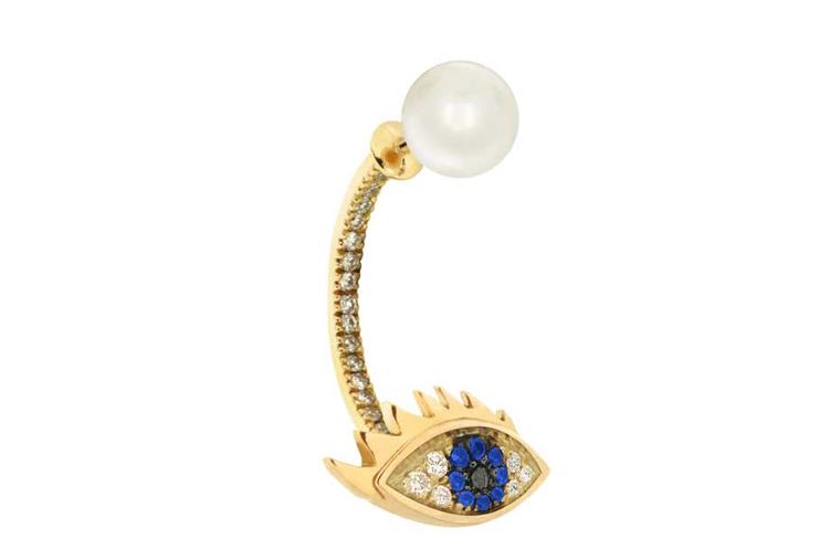 Delfina Delettrez Eye Piercing earring in gold with diamonds, blue sapphires, a black diamond and a pearl.