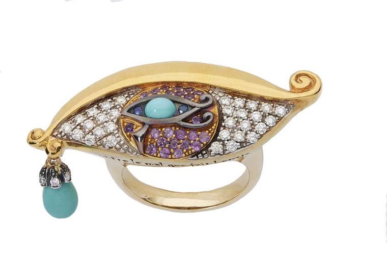 Sylvie Corbelin Fascination collection gold ring featuring diamonds, colourful gem-set irises and a turquoise charm hanging from the tear duct.