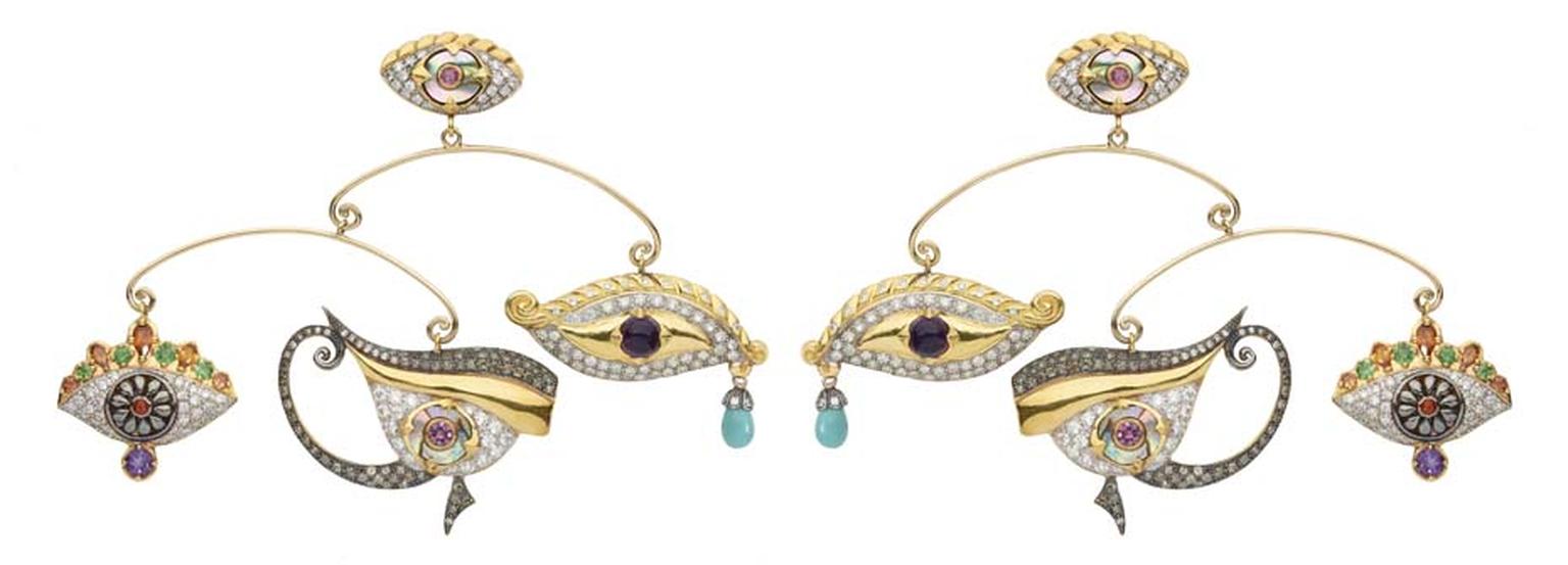 Sylvie Corbelin Fascination collection mobile earrings featuring three gem-encrusted eyes suspended from a central stud, also in the shape of an eye.