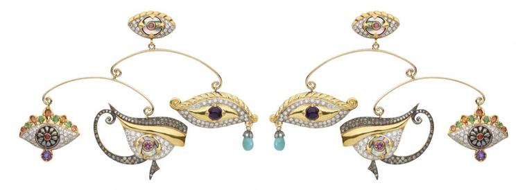 Sylvie Corbelin Fascination collection mobile earrings featuring three gem-encrusted eyes suspended from a central stud, also in the shape of an eye.