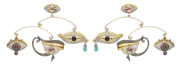 Sylvie Corbelin Fascination collection mobile earrings featuring three gem-encrusted eyes suspended from a central stud, also in the shape of an eye.