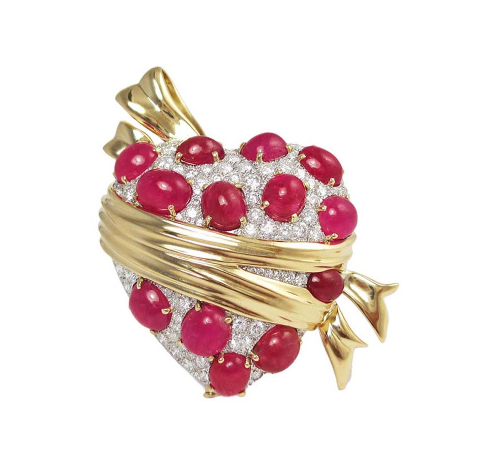 Verdura Sashed Heart brooch, set with rubies and diamonds in gold, was first commissioned by Tyrone Power for his wife Anabella in 1941 and has been recreated to celebrate Verdura's 75th anniversary.