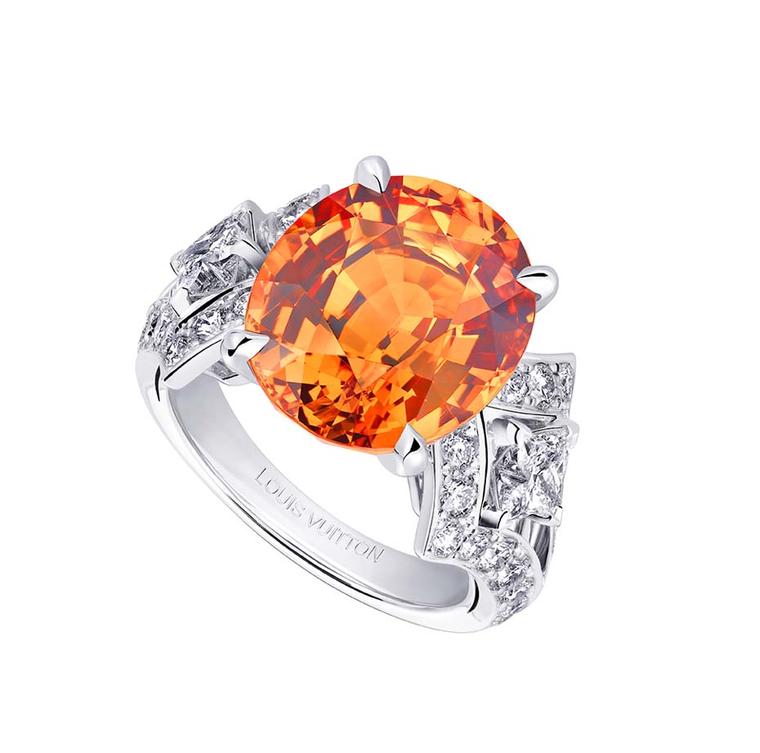 Louis Vuitton Acte V Genesis ring featuring a central mandarin garnet surrounded by diamonds.