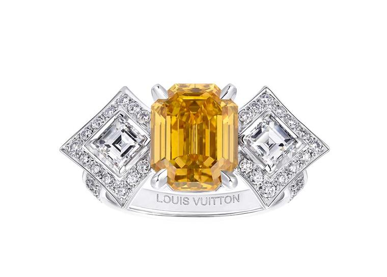 Louis Vuitton Acte V Genesis ring featuring a central orange yellow diamond surrounded by emerald-cut and brilliant-cut diamonds.
