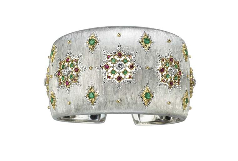Buccellati Lastra cuff featuring round faceted rubies and emeralds, and brilliant-cut diamonds.