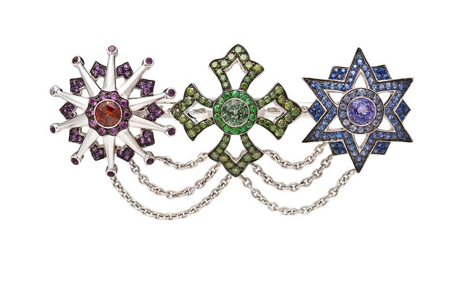 Garrard Star and Garter collection double ring featuring black gold with red garnet, amethyst, green diamond, tsavorites, green tourmaline, tanzanite and blue sapphire.