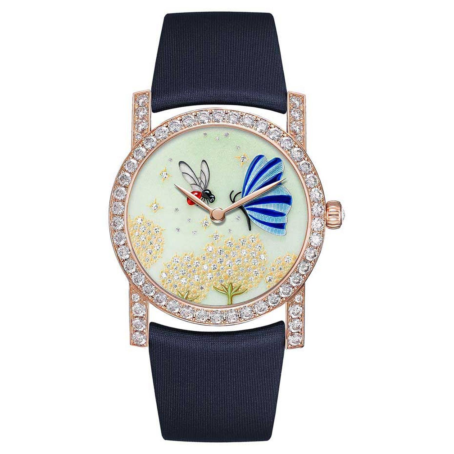 Chaumet Attrape-moi…si tu m’aimes collection watch featuring a bee with wings made out of rock crystal and a butterfly, both hand-painted on mother of pearl, hovering over golden dandelion flowers set with brilliant-cut diamonds.