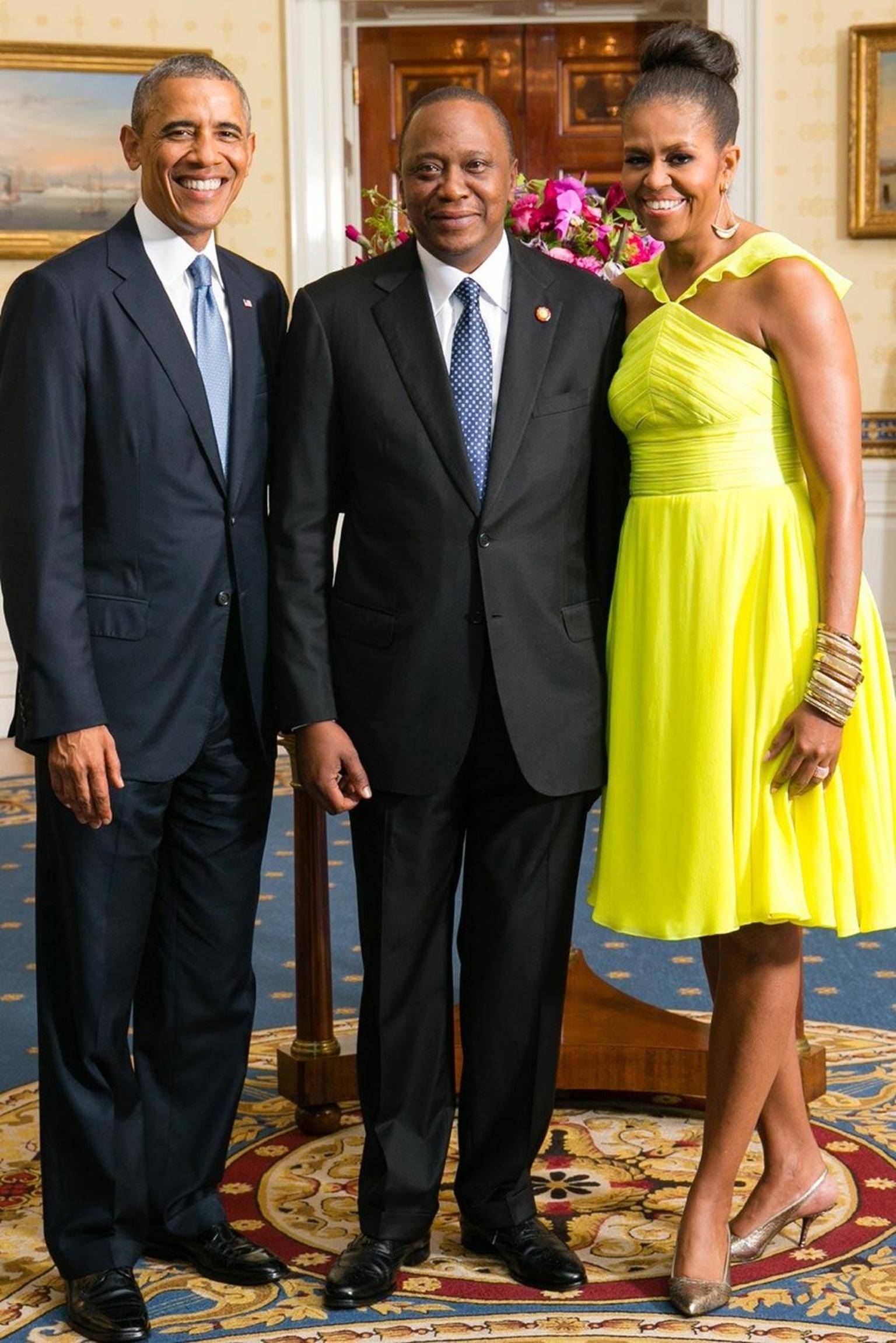 In a symbolic gesture captured in this photograph of the American president and his wife posing with Uhuru Kenyatta - the President of Kenya - the First Lady wore a stack of horn and bronze Nene Bangles by Ashley Pittman, made by artisans in workshops in 