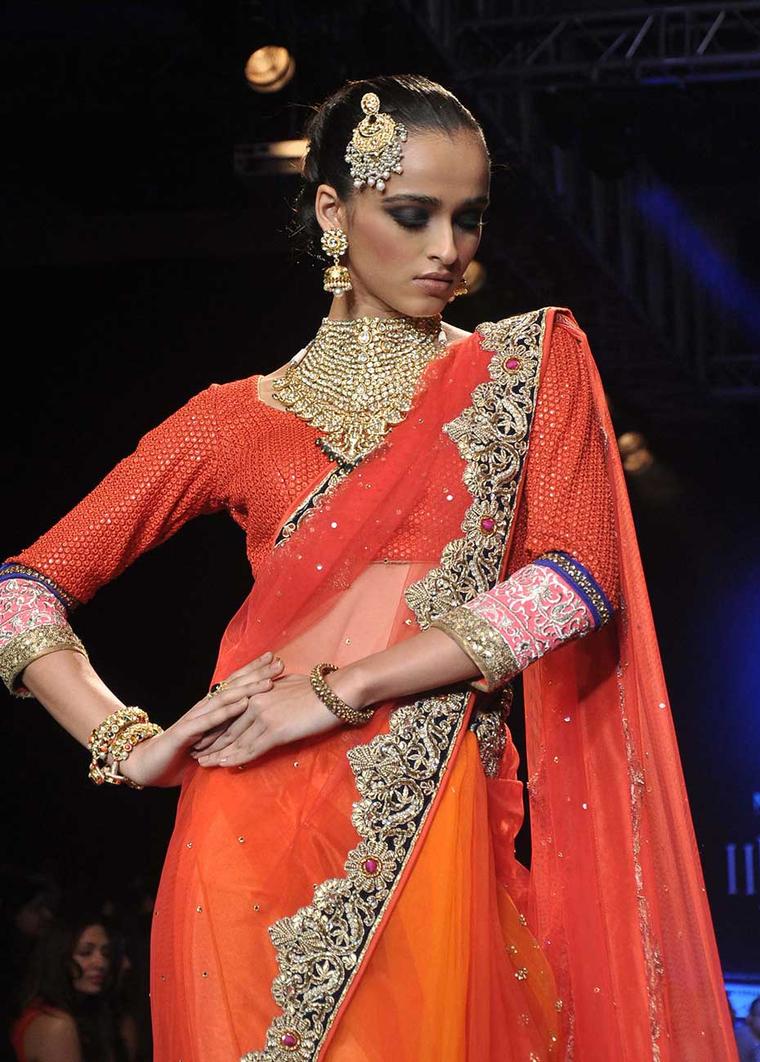 A model showcasing Vijay Golecha's latest collection at International India Jewellery Week 2014.