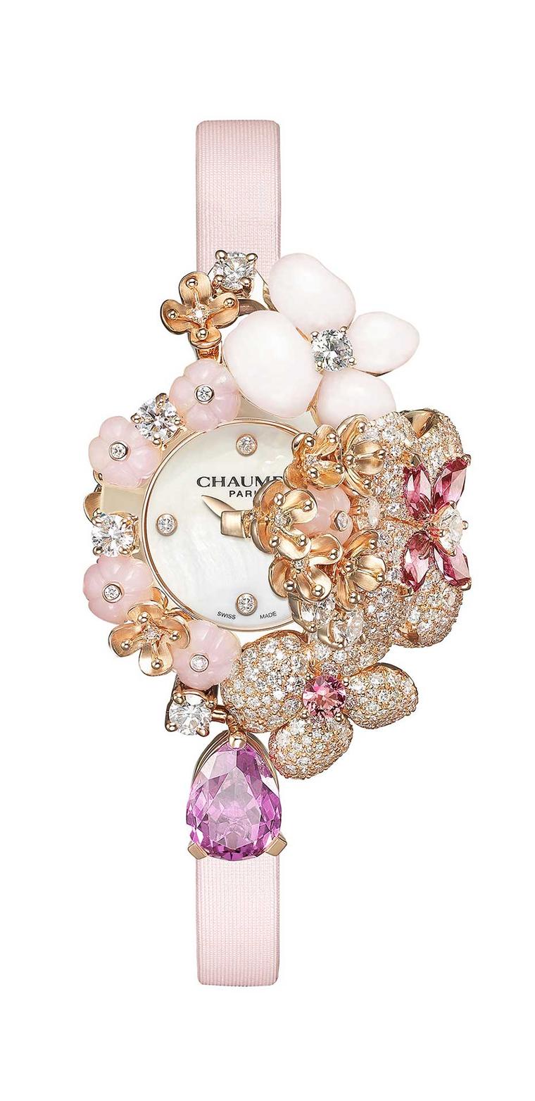Chaumet’s Hortensia Secret jewellery watch features a bouquet of powder-pink flowers sculpted in precious gemstones and set with diamonds and pink sapphires, the hours and minutes slip by on a mother-of-pearl dial.