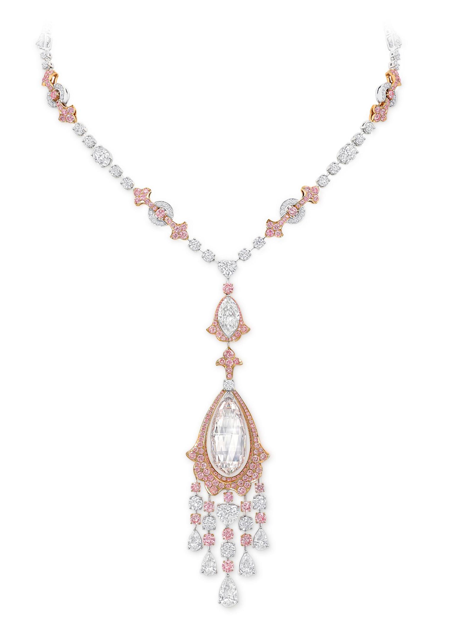 Graff diamond necklace featuring 388 pink and white diamonds and a 30.94ct very light pink briolette diamond that has been weightlessly suspended within a rose gold frame and accentuated with a cascade of white and pink diamonds.