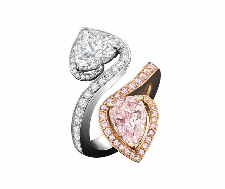 Boodles Gemini Heart ring set with a heart-shaped white diamond and oval-cut pink diamond in white and pink gold.