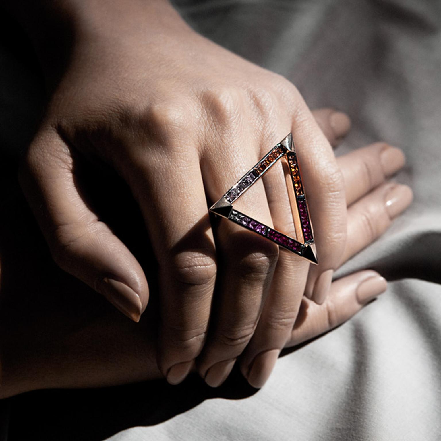 Hannah Martin's Comte Pyramid ring, designed as a piece of sculpture, is set with rubies and orange and magenta sapphires in blackened gold. Image by Joss McKinley.