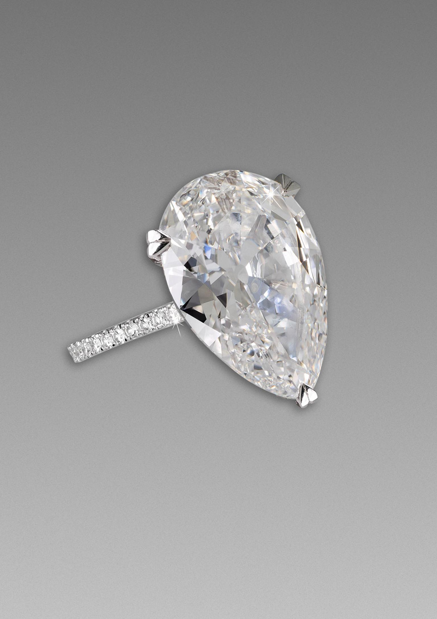 David Morris 8.59ct pear-cut engagement ring with a pavé diamond band.