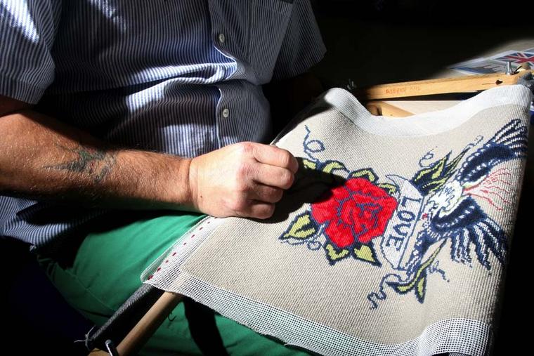 The Fine Cell Work charity teaches creative needlework to inmates; giving them the opportunity to earn money while also helping them cope with life in and out of prison.