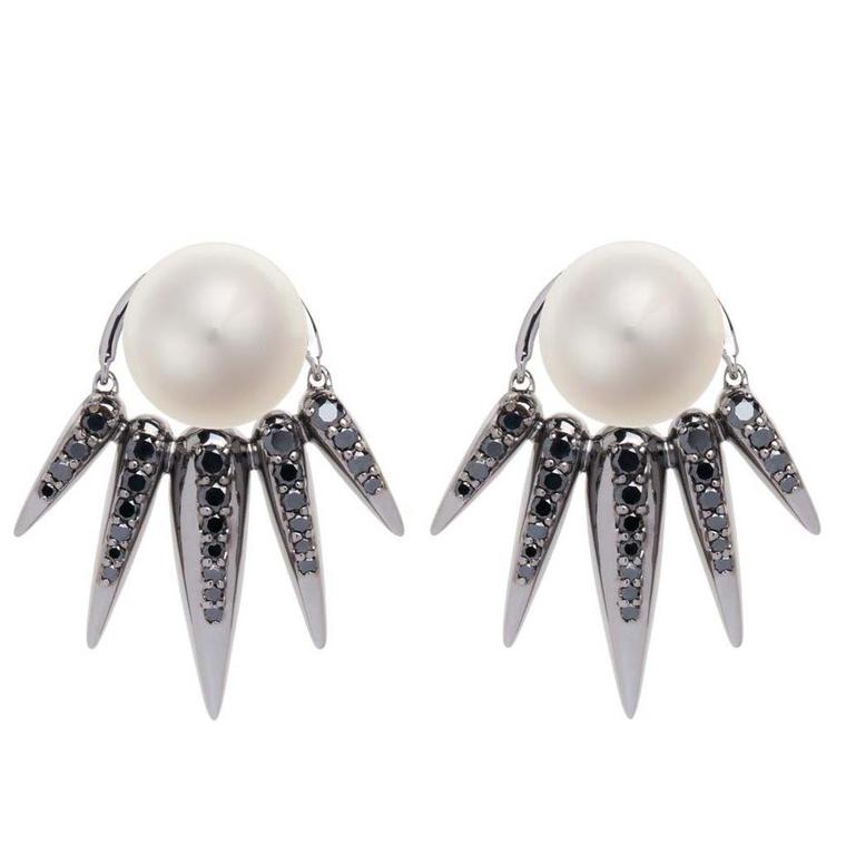 Nikos Koulis Spectrum collection stud earrings featuring black diamond spikes cradling a classic white pearl.