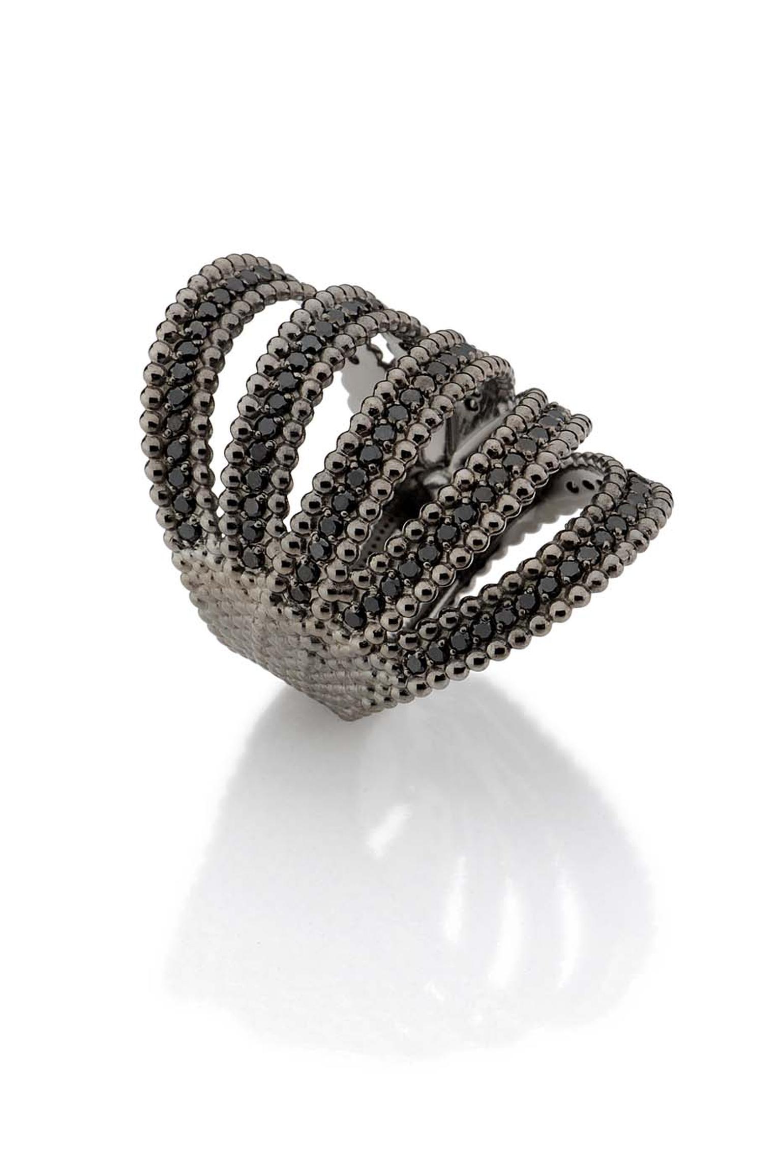 Carla Amorim Fountain black diamond ring set in black gold.