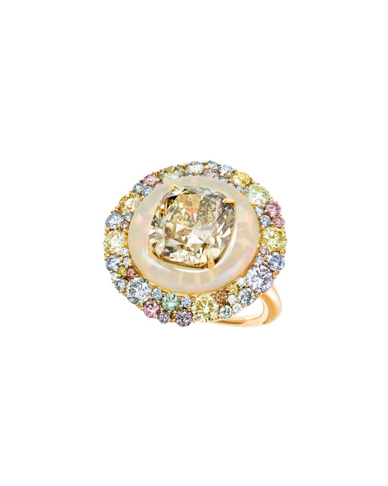 The deep brownish greenish yellow diamond in Tiffany & Co.'s ring is inlaid into an opal encircled by a swath of coloured diamonds.